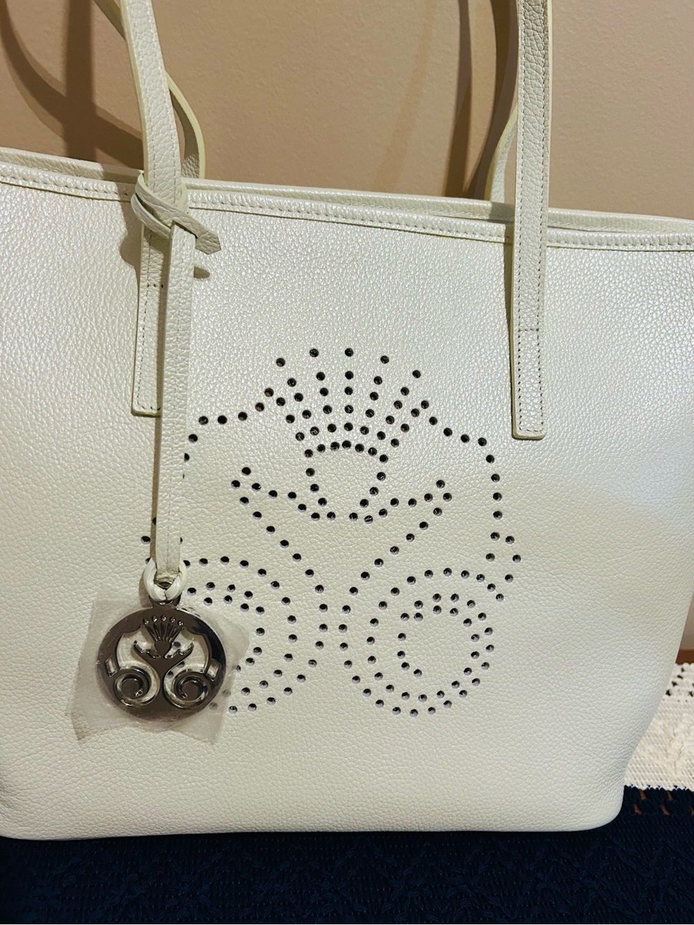 Women’s White Perforated Tote Bag with Charm - Picture 2 of 10
